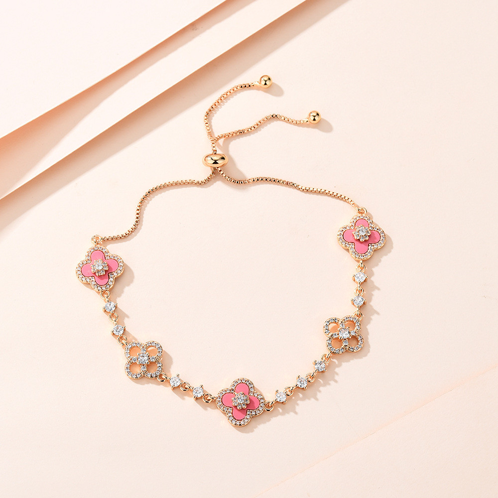 Phiên bản cao mạ vàng thật bốn cánh hoa Zircon May Mắn Cỏ Bốn Lá Hoa Sâm panh Vàng tính khí Vòng tay có thể điều chỉnh EK2S