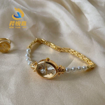 Đồng hồ nữ nhỏ Tinh tế hình bầu dục Con trỏ Đồng hồ đeo tay ngọc trai Đồng hồ nữ Ánh sáng sang trọng Thời trang trọng Đồng hồ thời trang sang trọng Đồng hồ trang sức NTXB