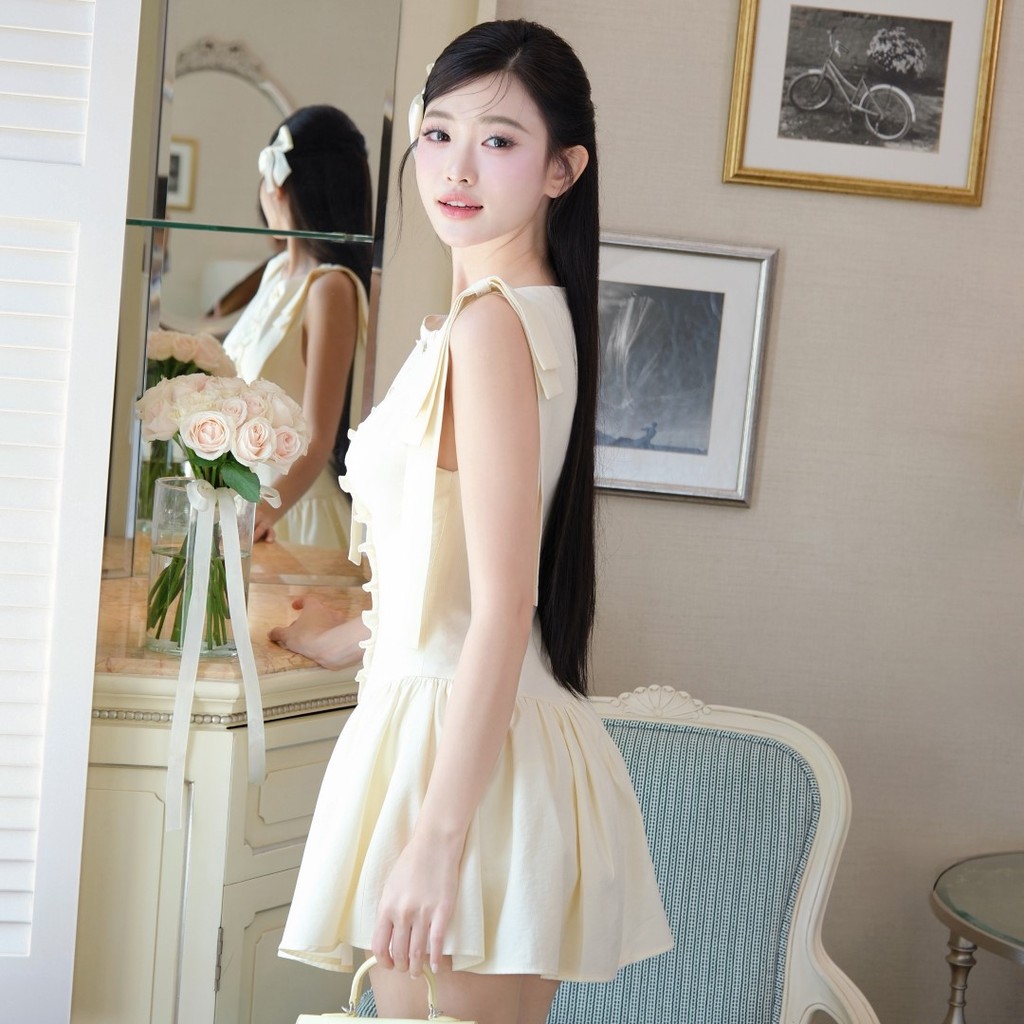 Đầm xòe Khiết Fashion tone vàng pastel ngọt ngào phối nơ bèo nhúng xinh xắn, phong cách nữ tính KD197