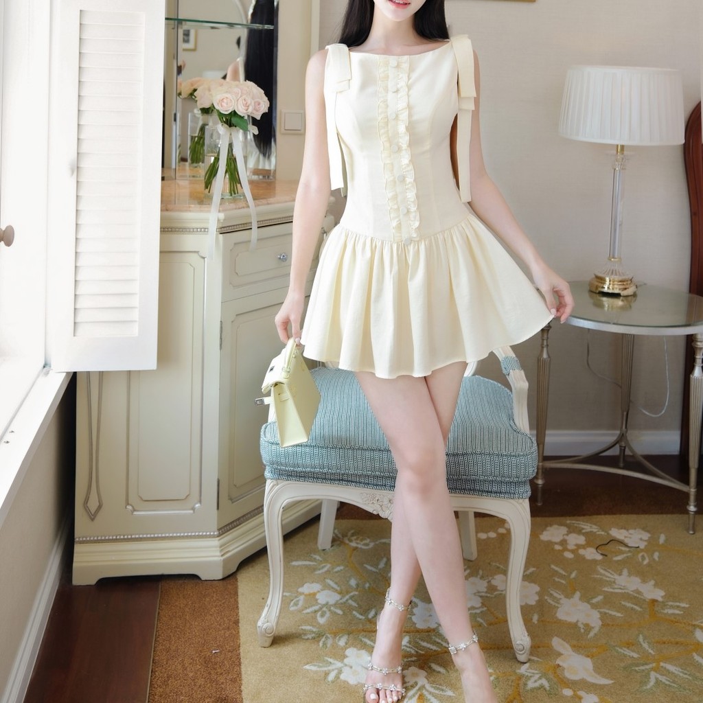 Đầm xòe Khiết Fashion tone vàng pastel ngọt ngào phối nơ bèo nhúng xinh xắn, phong cách nữ tính KD197