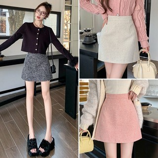 Váy chữ A ôm mông dễ phối tôn dáng cạp cao cổ điển màu đen len