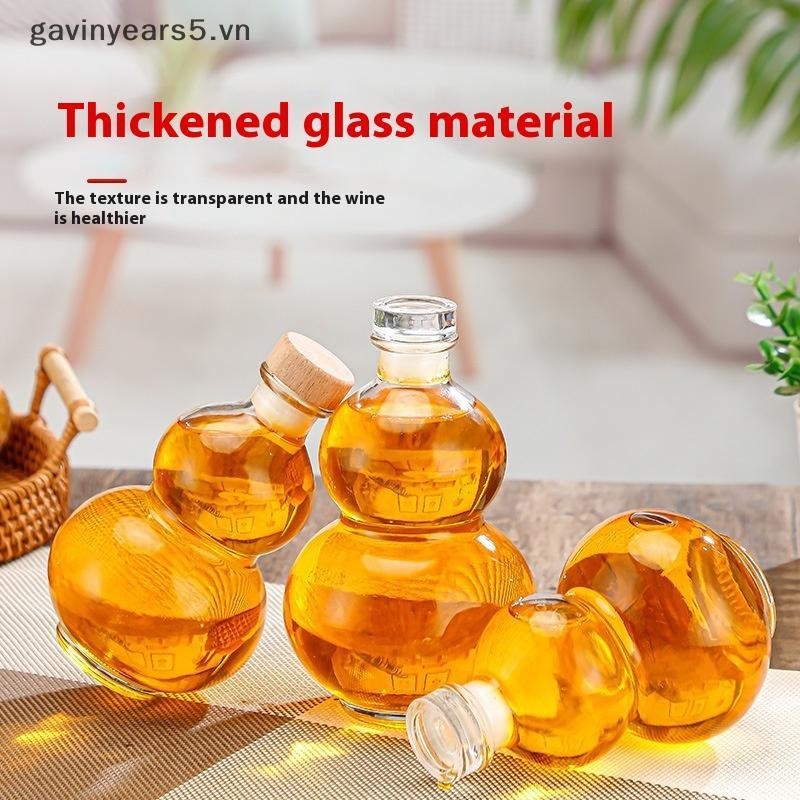 # gavin # Chai rượu thủy tinh Borosilicate cao hình bầu trong suốt Chai rượu thủy tinh chịu nhiệt Chai rỗng có nắp Chai trà sữa Chai pha lạnh.