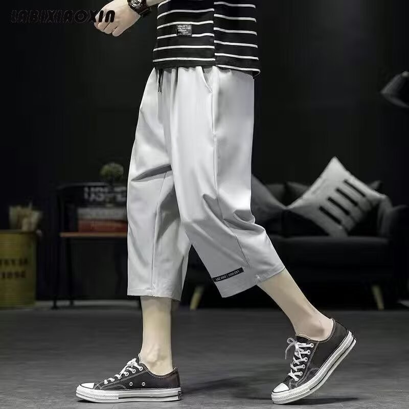 Quần short nam mùa hè nhẹ dáng rộng vừa vặn phong cách thể thao khô nhanh