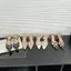 Giày sandal dây đeo chéo mũi nhọn TT Tính khí nữ Dây đeo khóa phẳng Không mệt mỏi Mùa hè