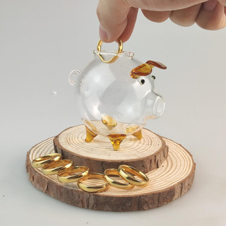 "Heo đất thủy tinh trang trí bàn thiết kế tinh tế là nơi lý tưởng để bắt đầu thói quen tiết kiệm vàng xu trực quan "