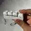 Móc khóa HFTOY có bàn phím để giảm căng thẳng Đồ chơi 4 / 9 nút Bàn phím cơ thư giãn và yên tĩnh Dễ dàng loại bỏ Điều chỉnh lại ~