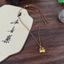 Mặt dây chuyền vàng mỡ may mắn phong cách cá tính, dài phù hợp với xương đòn