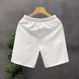 Quần short nam dáng rộng, phù hợp đi biển và mặc hàng ngày vào mùa hè.