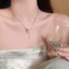 Vòng cổ nữ sang trọng với ngọc trai và tua rua họa tiết bướm vàng