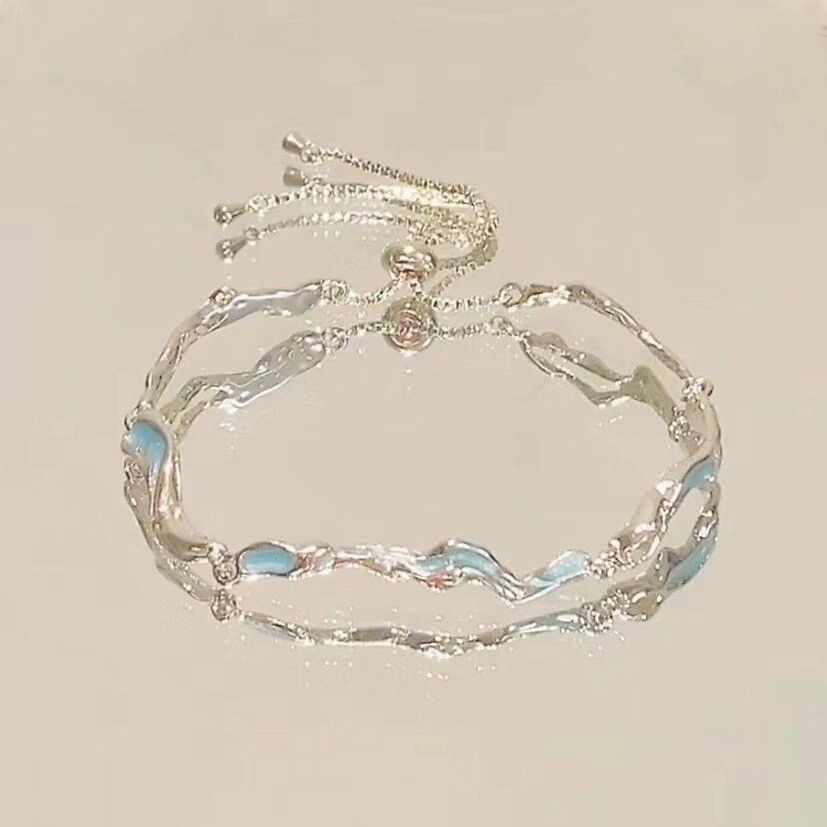 Vòng tay nơ hoa anh đào Zircon màu hồng, tinh tế và cao cấp - Quà tặng hoàn hảo cho bạn bè