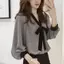 Áo sơ mi cổ chữ V dài tay nữ, thiết kế rộng rãi với chi tiết nơ thời trang