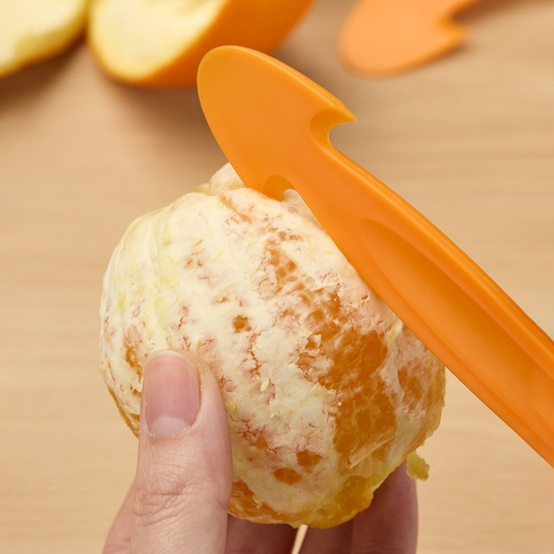 Dụng cụ gọt vỏ trái cây màu cam cho quả bưởi quýt cam