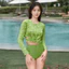 Đồ bơi hai mảnh tay dài in hình, phù hợp cho kỳ nghỉ biển