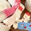 Dày để giữ ấm hoạt hình Hello Kitty Mid-Tube Tất Cotton chải màu nữ