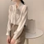 Áo sơ mi nơ nữ dài tay mùa xuân, chất liệu voan mềm mại, phù hợp công sở và các dịp trang trọng.