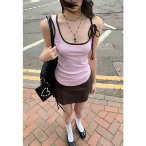 <![CDATA[Áo yếm nữ mùa hè với bow tie và màu sắc tương phản, dáng slim]]>