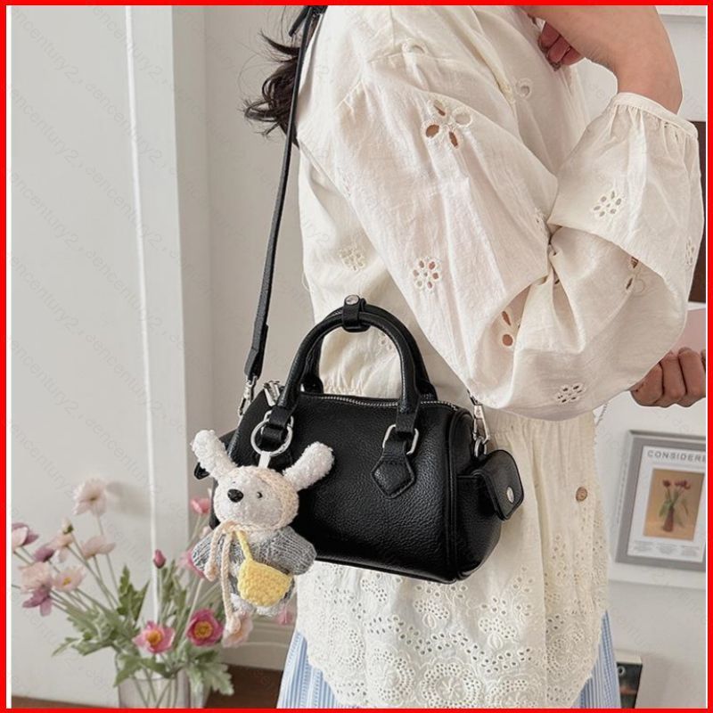 Túi đeo vai phong cách Hàn Quốc GC2 dành cho nữ kết cấu mới Túi đeo chéo cá nhân màu trơn túi hàng ngày CG2