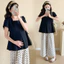 Bộ đồ bà bầu mùa hè gồm áo sơ mi và quần ống rộng chấm bi, phù hợp cho thai kỳ mùa nóng.
