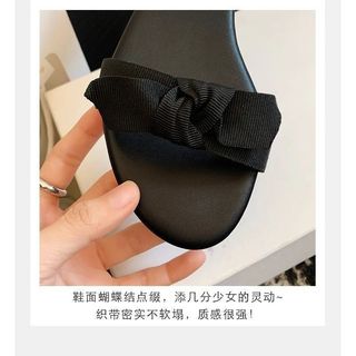 Phiên Bản Hàn Quốc Niche Thiết Kế Nơ Giày Sandal Nữ Mùa Hè 2026 Phong Cách Mới Retro Webbing Flat Back Strap Dép