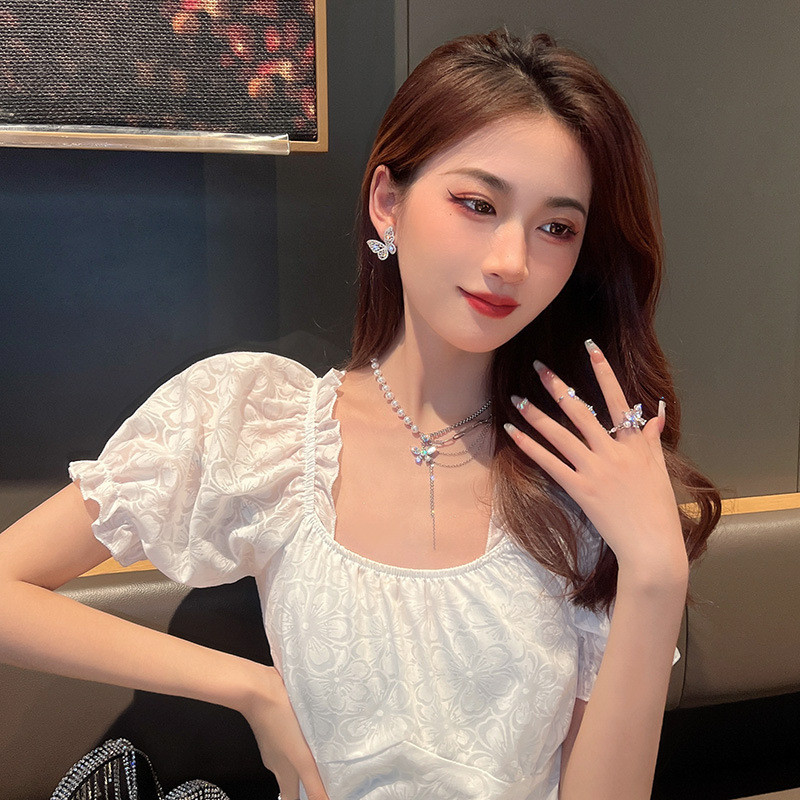 Phụ kiện thời trang nữ với ngọc trai hình bướm, dây chuyền cổ thanh lịch