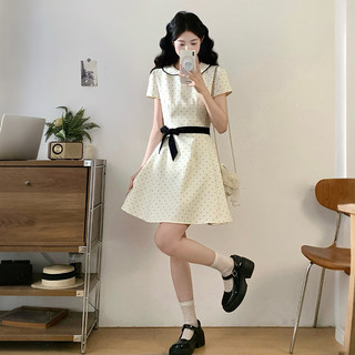 Đầm mùa hè dáng chữ A chấm bi kiểu Pháp duyên dáng với điểm nhấn nơ xinh xắn dành cho nữ.