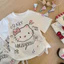 Áo cổ tròn ngắn tay in họa tiết hoạt hình Hello Kitty dễ thương cho bé gái với thiết kế dây rút