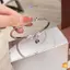 Chuông nơ bạc nữ - Trang sức thanh lịch và quyến rũ cho tiệc cưới hoặc làm quà tặng mới