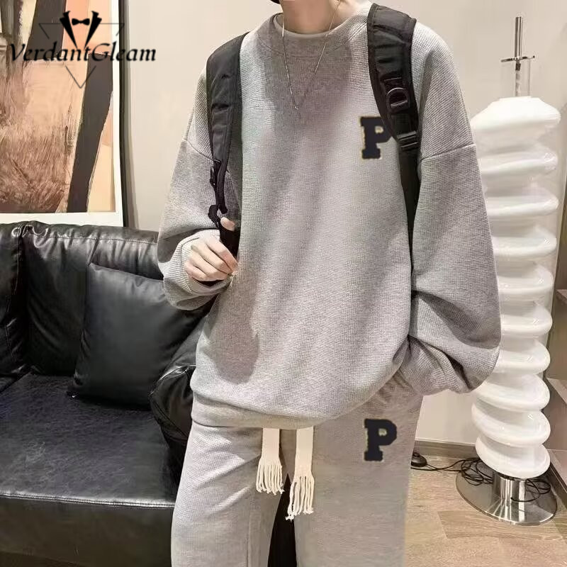 Bộ đồ thu nam áo nỉ cỡ lớn, có logo và quần tua rua
