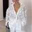 Áo sơ mi nữ form rộng thêu họa tiết lá, phong cách công sở nhẹ nhàng