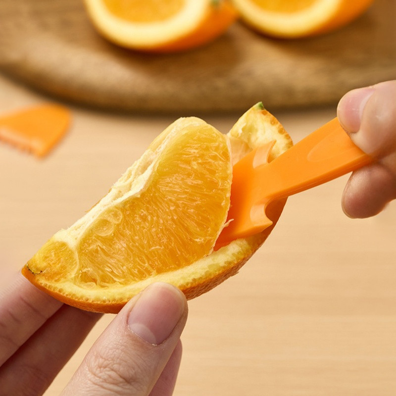 Dụng cụ gọt vỏ trái cây màu cam cho quả bưởi quýt cam