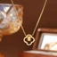 Dây chuyền thép titan mạ vàng 18K thiết kế bốn lá cỏ ba lá