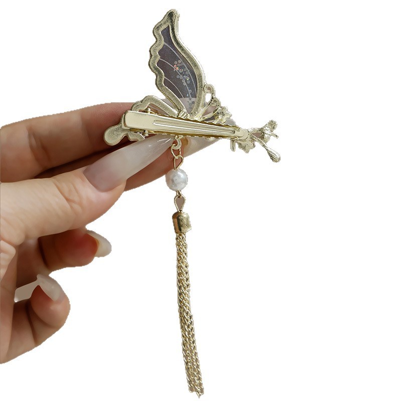 Kẹp tóc nữ kiểu dáng Trung Quốc, nơ bướm lớn tua rua mới lạ