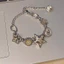Vòng tay nữ đa năng thời trang và đa năng zircon star heart button