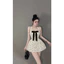 Đầm chấm bi cổ yếm nơ ngực phối chân xoè cực xinh BYJOLIE