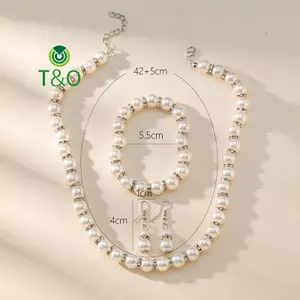 Bộ trang sức ngọc trai ABS gồm vòng tay và bông tai, phù hợp làm quà tặng cho mẹ