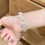 Vòng tay nữ handmade với họa tiết bướm trắng tinh tế, phù hợp thời trang