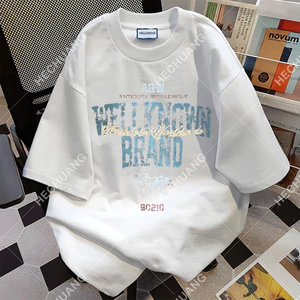 Áo thun ngắn tay phong cách đường phố với họa tiết và chữ in, làm từ 100% cotton, hoàn hảo cho các cặp đôi.