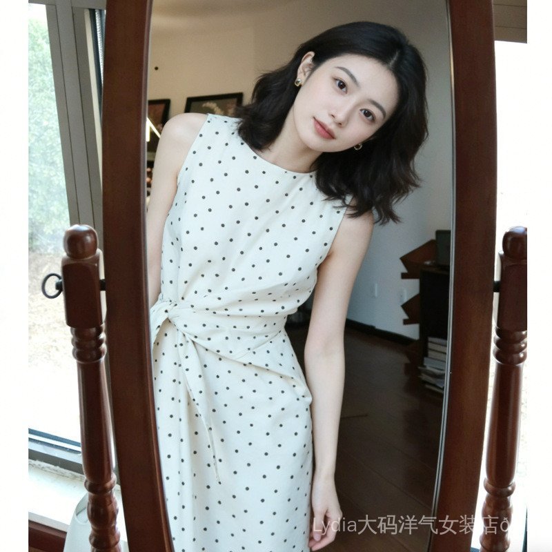 Đầm vest nữ mùa hè chất lượng cao, không tay, họa tiết chấm bi với thiết kế dây eo nhỏ và dáng dài chữ A