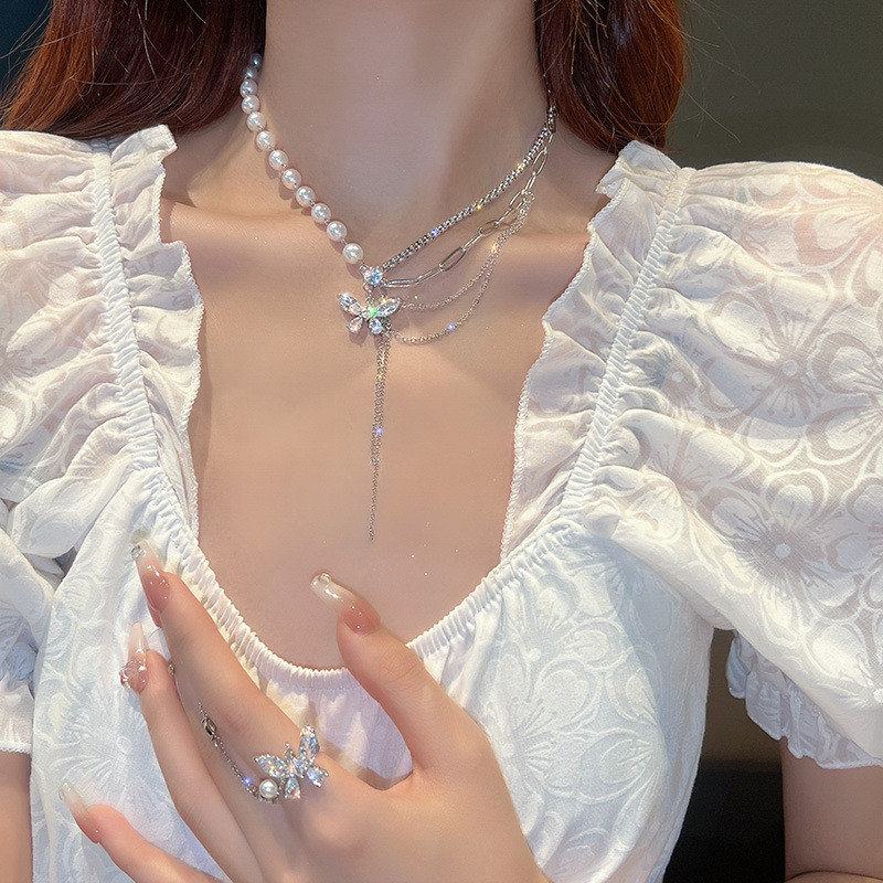 Phụ kiện thời trang nữ với ngọc trai hình bướm, dây chuyền cổ thanh lịch