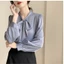 Áo sơ mi nơ nữ dài tay mùa xuân, chất liệu voan mềm mại, phù hợp công sở và các dịp trang trọng.