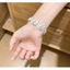 Vòng tay nữ handmade với họa tiết bướm trắng tinh tế, phù hợp thời trang