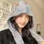 Mũ bảo vệ tai dệt kim casual hoa nhỏ, chống gió và ấm áp