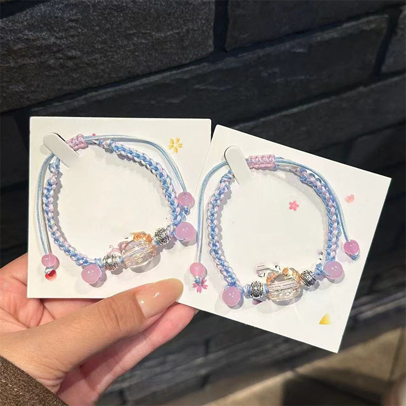 Vòng tay Hello Kitty dệt tay màu xanh hồng - phụ kiện quà tặng đáng yêu