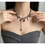 Vòng cổ nữ phong cách gothic và punk với tua rua đỏ zircon hình học