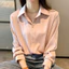 Áo sơ mi nữ màu đen, dáng dài tay và cổ đứng, phù hợp thời trang hàng ngày