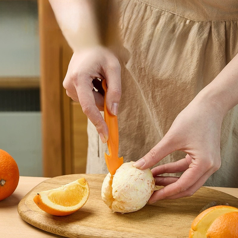 Dụng cụ gọt vỏ trái cây màu cam cho quả bưởi quýt cam