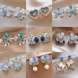 Bông tai zircon bướm hoa màu xanh, chất liệu cao cấp, phù hợp cho người yêu thích phong cách thời trang tinh tế