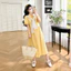 Bộ đồ bà bầu gồm áo sơ mi và váy ngắn hai mảnh, kèm khăn choàng