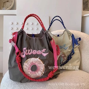 Dây chuyền bóng Nhật Bản Thân thiện với môi trường Gao Yuanyuan Cùng phong cách Túi vải Nylon thêu mua sắm đeo chéo nữ