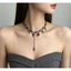Vòng cổ nữ phong cách gothic và punk với tua rua đỏ zircon hình học